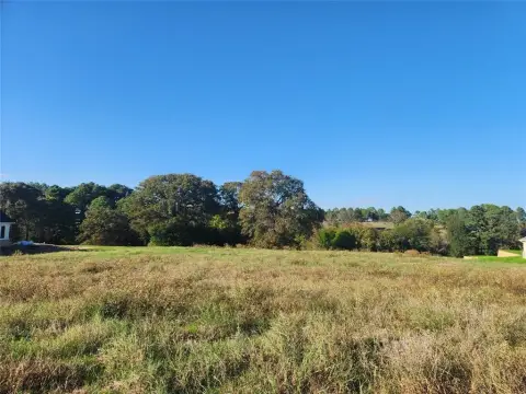 Picturesque Lot Overlooking Neighboring Lake