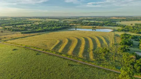 Scenic Land with Stocked Pond