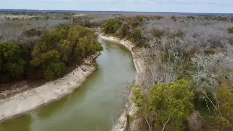 Hardwood Retreat with River Frontage