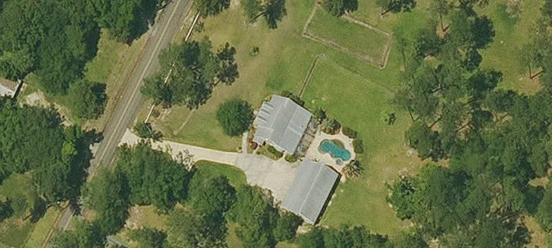Lacombe Acreage with Versatile Buildings