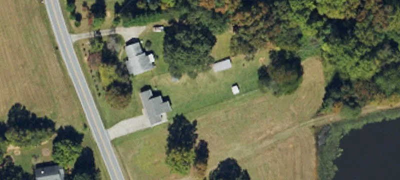 Versatile Acreage with Renovation Potential