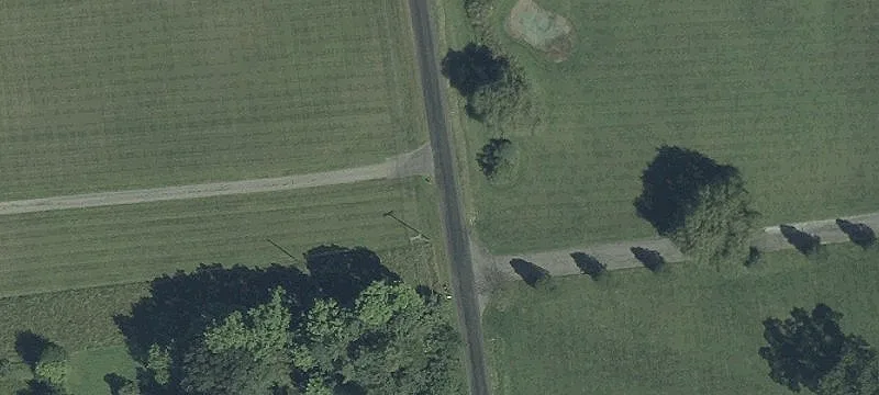 Level Land with Wooded Area