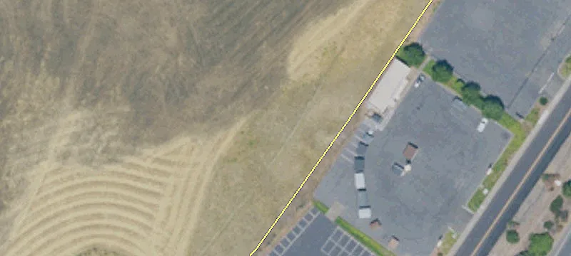 Paved Lot with Freeway Visibility