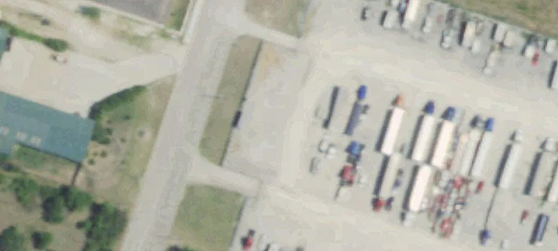 Fenced Land with Redevelopment Potential