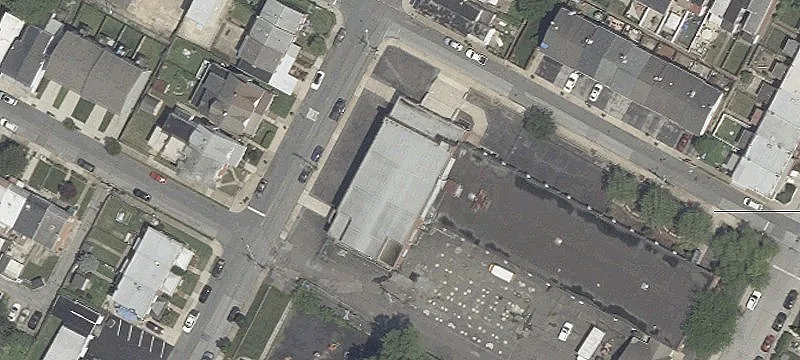 Multi-Level Building with Parking Lot