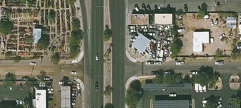 Automotive Property with Canopy Cover