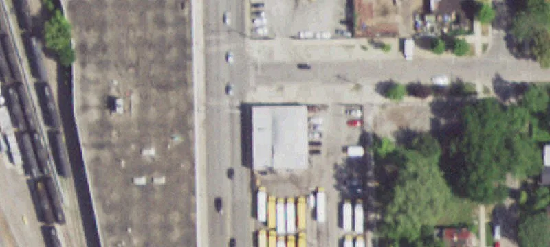 Paved Land with Chain-Link Fence