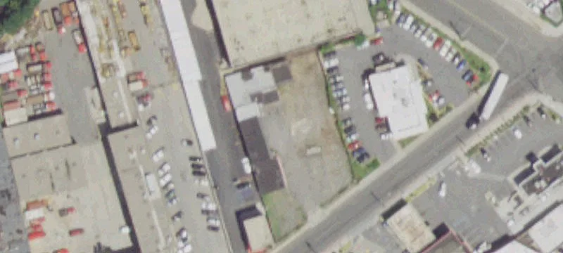 Fenced, Paved Industrial Land