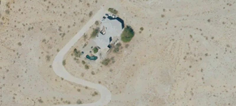 Land with Valley and City Views