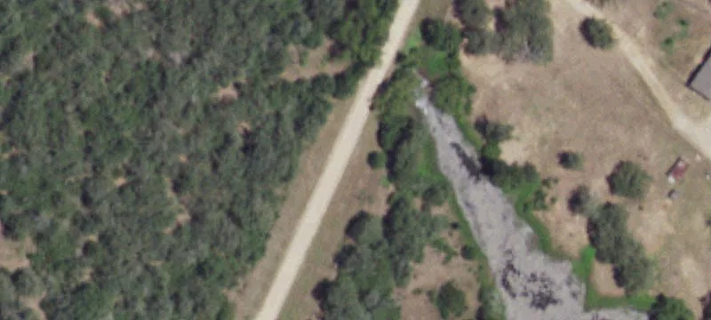 Wooded Acreage in Woodcreek Subdivision