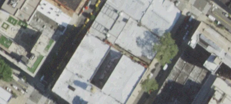 Brick Multifamily Building Near Train