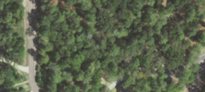 Expansive Corner Lot with Water Views