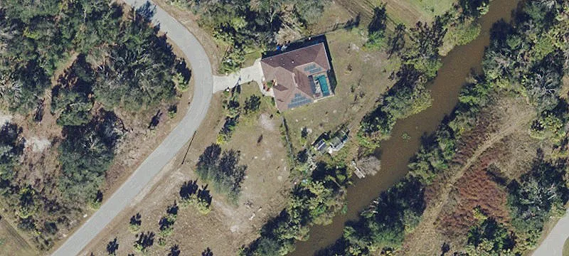 Wooded Canal Lot in North Port