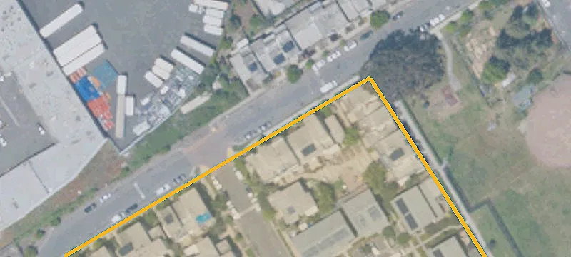 Cleared Lot in Developing Neighborhood