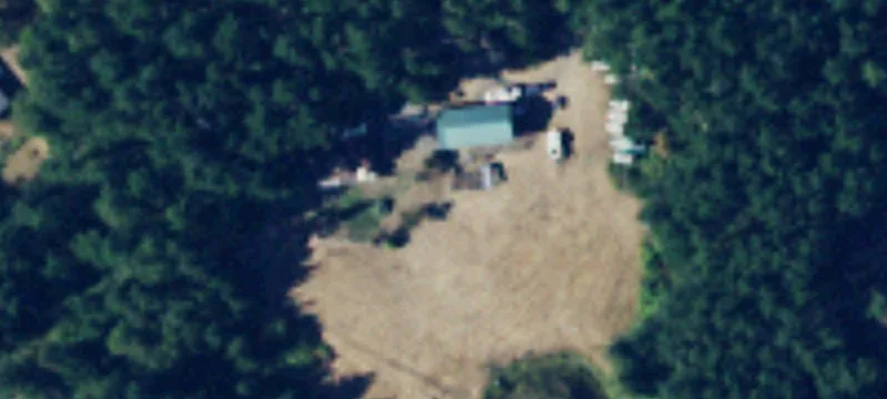 Secluded Wooded Acreage Near Town