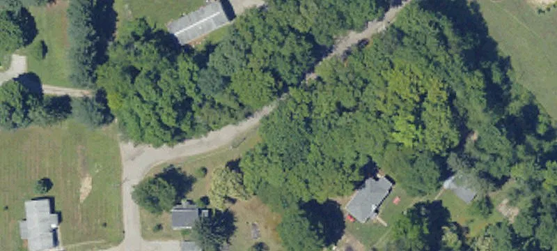 Wooded Acreage Conveniently Located