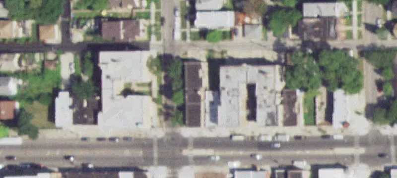 Corner Building with Proposed Plans