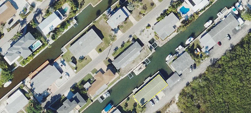 Canal-Front Lot with Twin Lifts