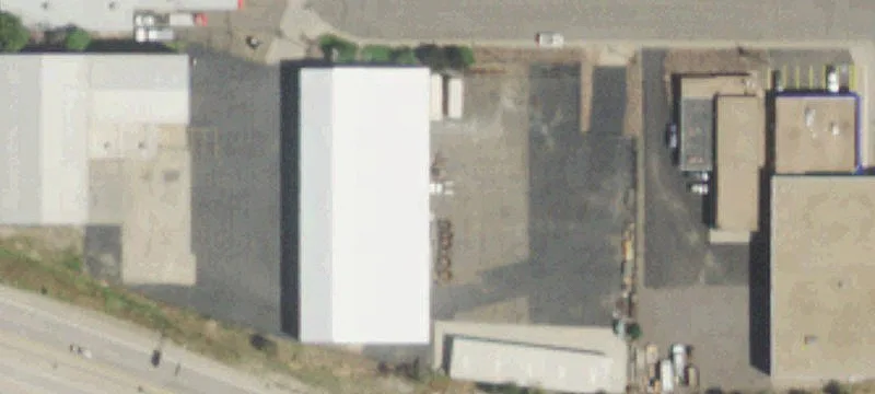 Warehouse with Cranes and Yard