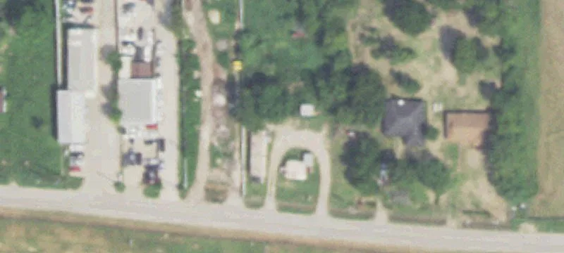 Unrestricted Land with Residential Structures