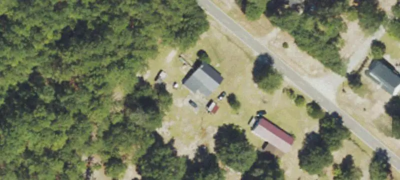 Undeveloped Land with Farmhouse