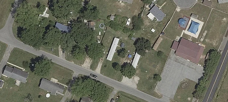 Land with Existing Home