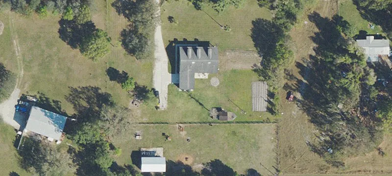 Fenced Land with Metal Building