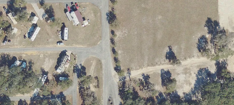 Corner Fenced Lot with Gate