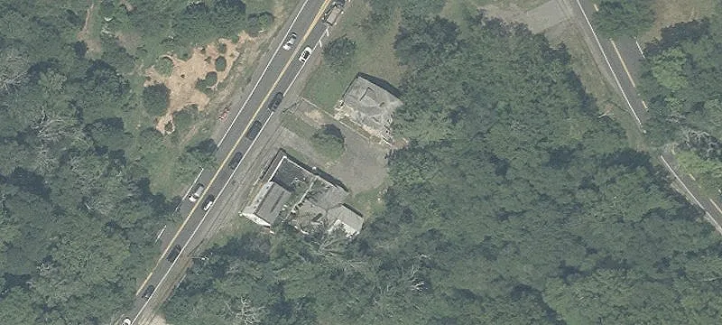 Commercial Land with Two Structures