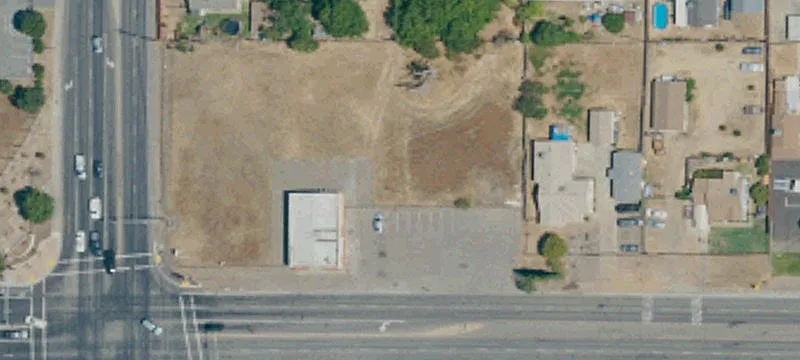 Land with Freestanding Building