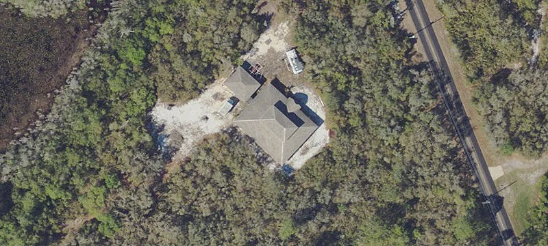 Private Wooded Land with Unfinished Structure