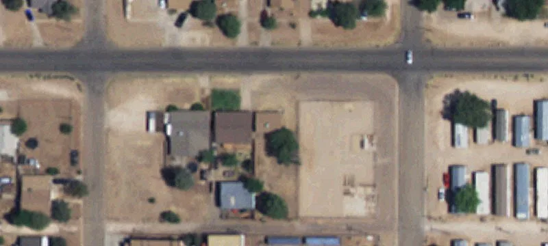 Fenced Corner Lot with Building