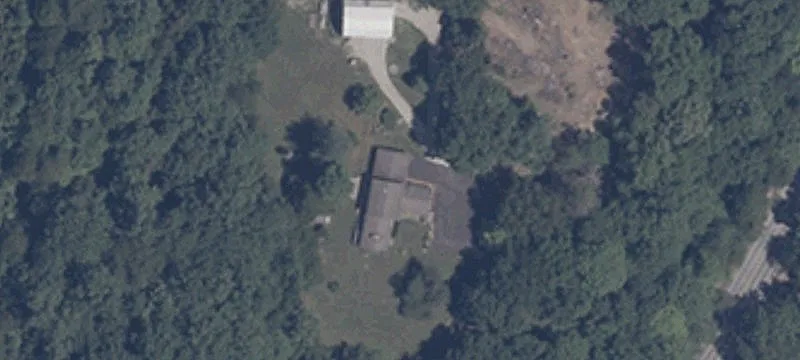 Hilltop Acreage with Barn and Garage