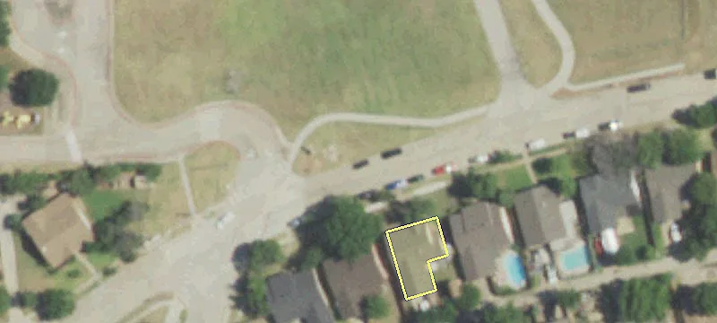 Land Bordered by Mature Neighborhoods
