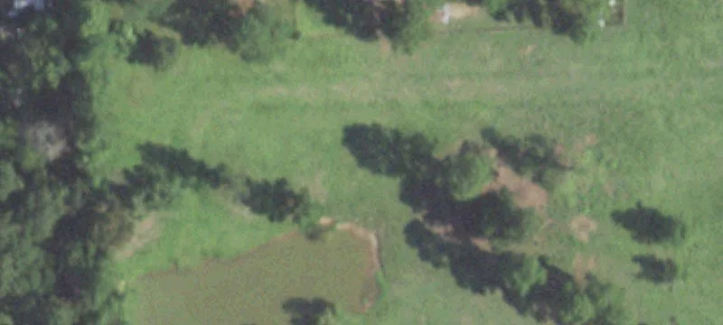 Unimproved Wooded Lot Near River