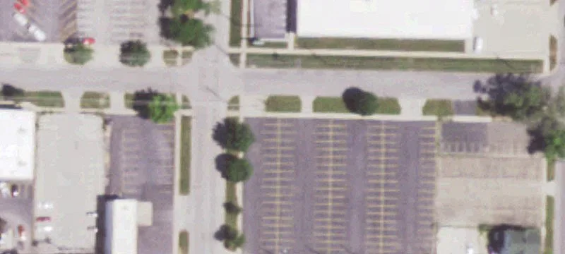 Paved and Fenced Parking Lot