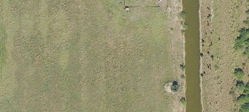 Expansive Agricultural Land with Warehouse