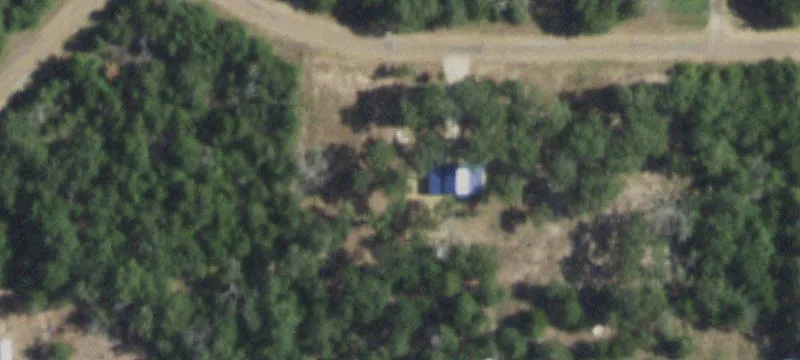 Fenced Lot with Metal Building