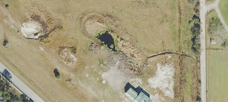 Cleared Land with Versatile Building