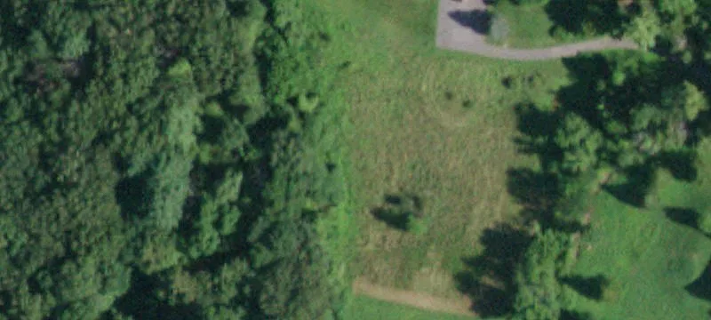 Cleared Lot on Quiet Road