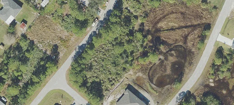 Wooded Lot in Booming Area
