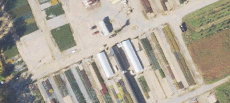60 Acres with Multiple Buildings