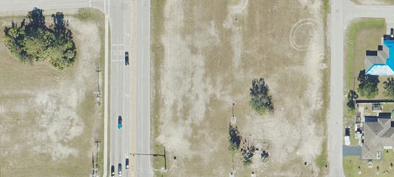 Signalized Commercial Corner For Sale