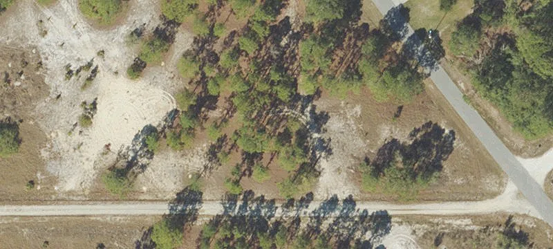 Lightly Wooded Lot Near Lakes
