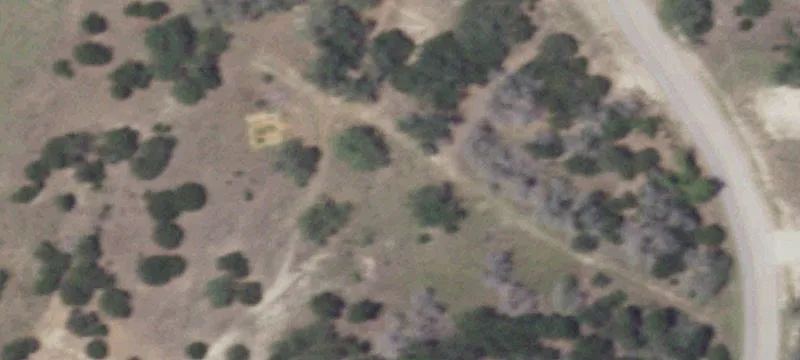 Land with Lake and Hill Views