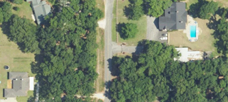 Wooded Land with River Frontage