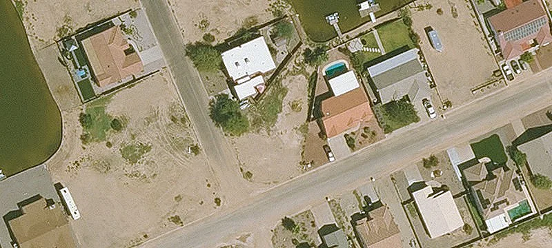 Corner Lot Backing Paradise Lake