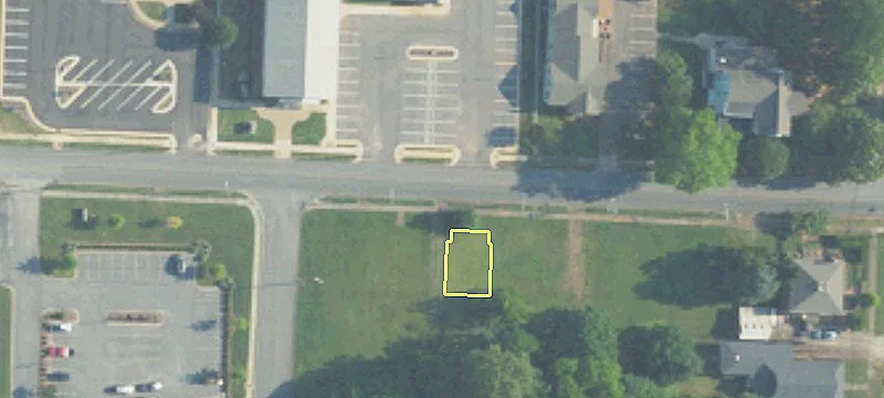 Fenced Gravel Lot Near Athens