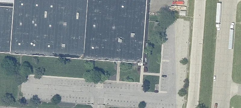 Industrial Warehouse on Fenced Lot