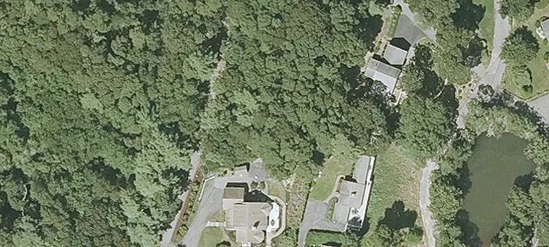 Wooded Lot with Water View Potential